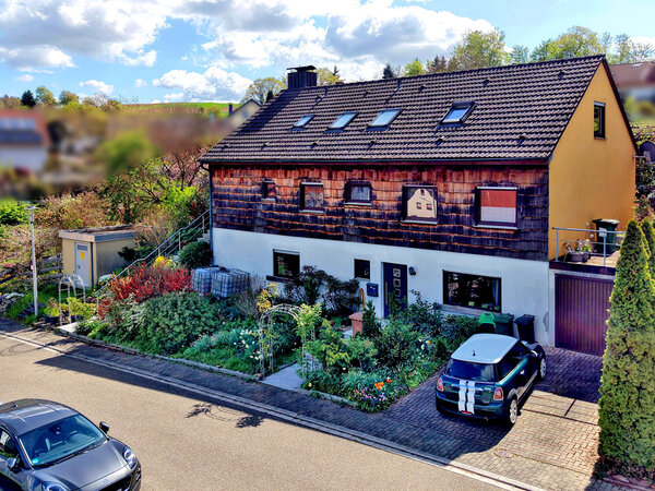Viel Platz für die Familie: Gepflegtes Wohnhaus mit großem Potenzial in Spe...